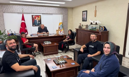 Başkan Uzun şampiyonları ağırladı