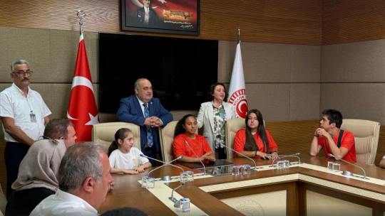Aldatmaz, özel çocukları ve ailelerini TBMM'de ağırladı