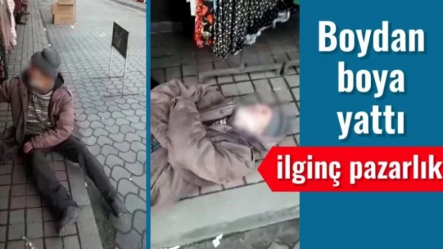 Kaldırıma boydan boya uzandı