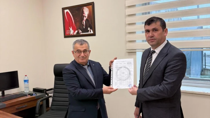 Özcan Uzun Mazbatasını Teslim Aldı